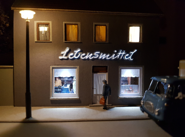 Lebensmittel Leuchtschrift bei Nacht