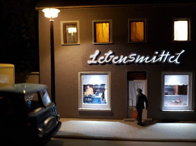 Lebensmittel Leuchtschrift bei Nacht